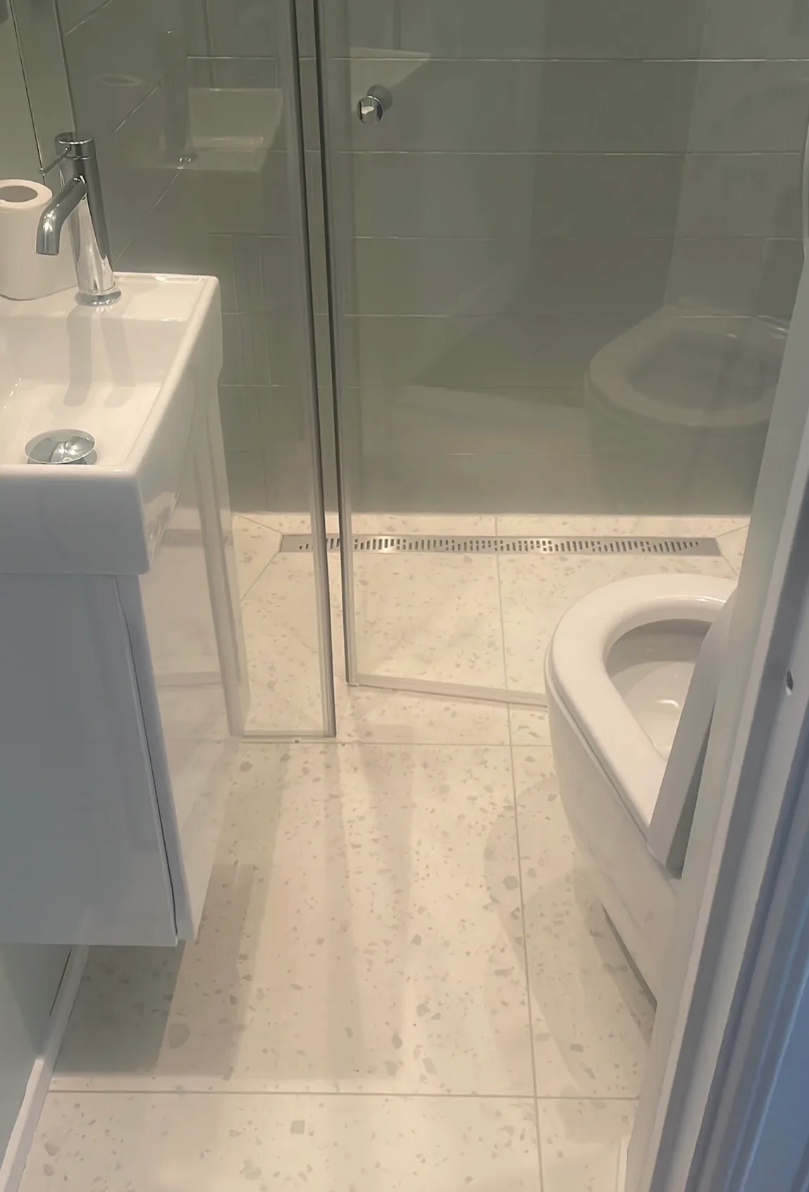 Modern bathroom renovation with glass shower