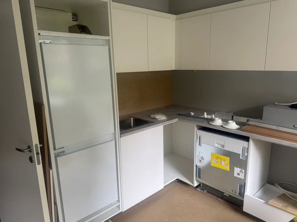 Modern kitchen cabinetry and appliance installation