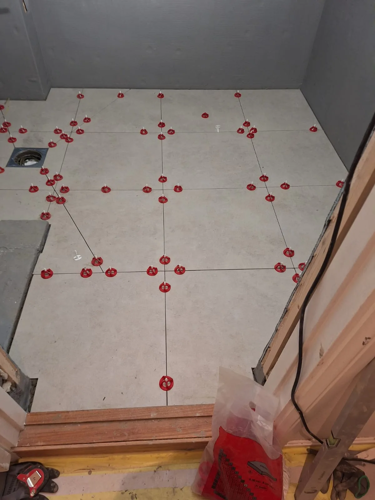 Ceiling anchor installation with guide strings